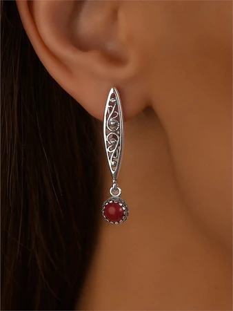 {{productViewItem.photos[photoViewList.activeNavIndex].Alt || productViewItem.photos[photoViewList.activeNavIndex].Description || 'Серьги из серебра с кораллом'}}
